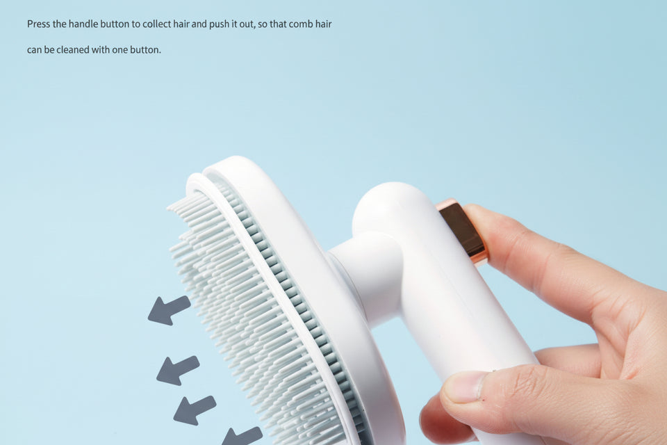 Close-up of self-cleaning button on pet hair removal brush