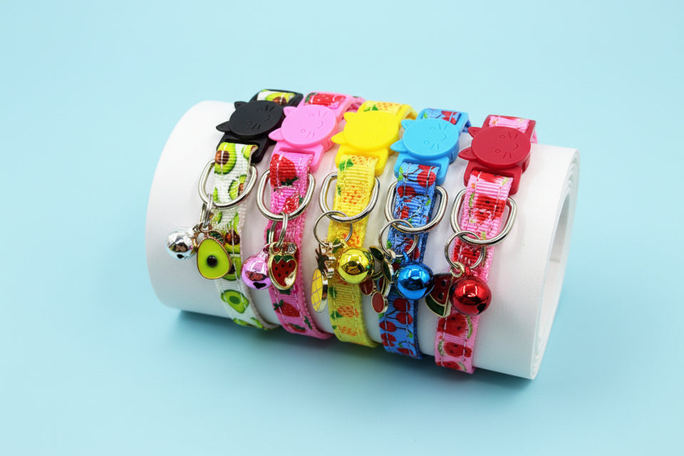 Assorted fruit print cat collars in strawberry cherry avocado watermelon designs