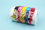 Assorted fruit print cat collars in strawberry cherry avocado watermelon designs