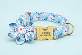Light blue floral dog collar with gold buckle and removable flower