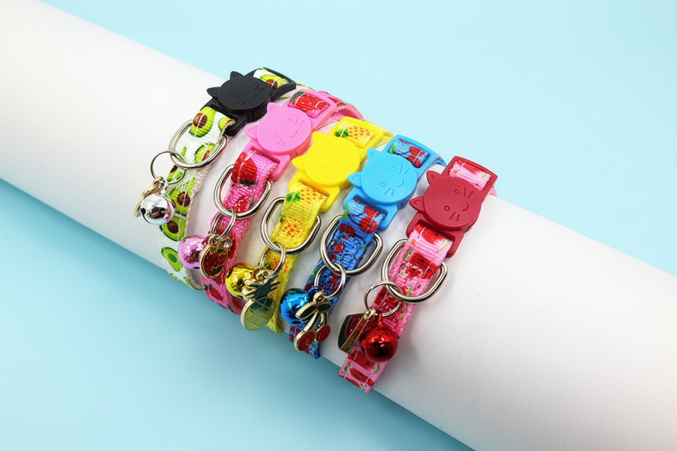 Full set of colorful fruit print cat collars with bells shown together