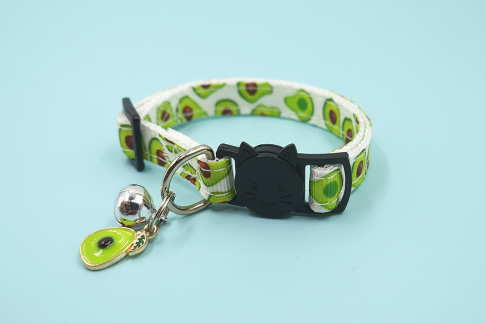 Green avocado print cat collar with silver bell and safety clasp