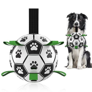 Inflatable dog soccer ball with green nylon tabs and paw print design