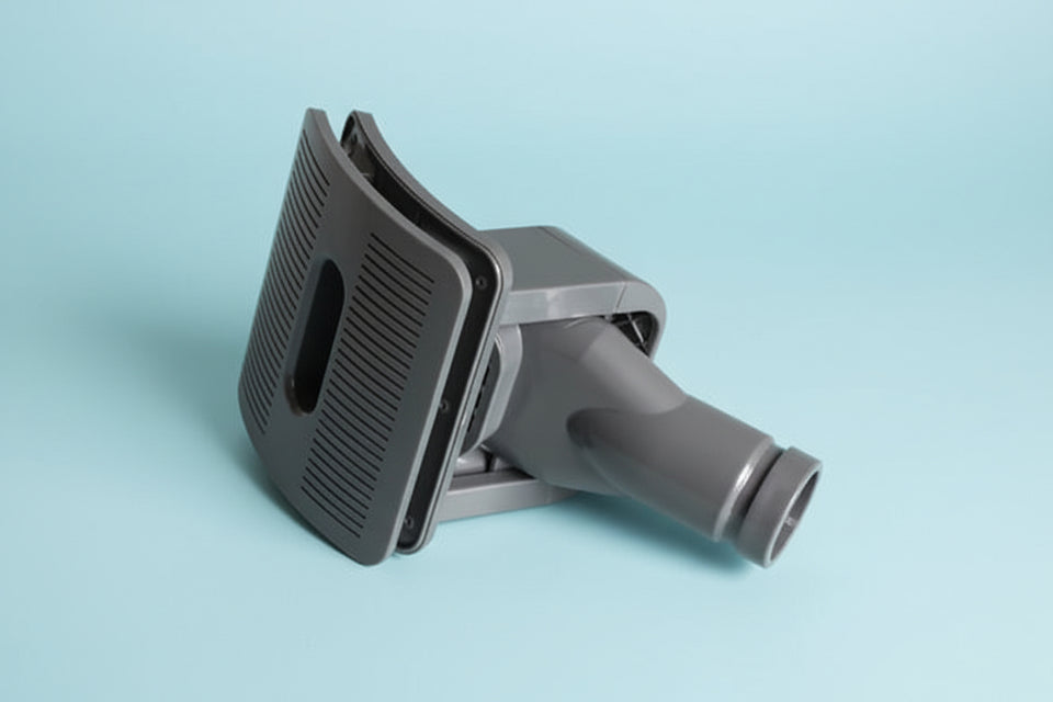 Detailed view of vacuum pet grooming brush nozzle and bristles