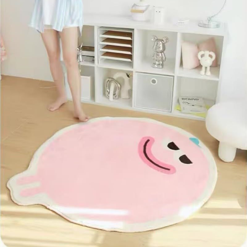 Soft pink cloud-shaped rug with smiling face design